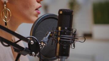 Recording audio at home using professional microphone. Creative online show presenter, Onair online production internet broadcast show host streaming live content, recording digital social media photo