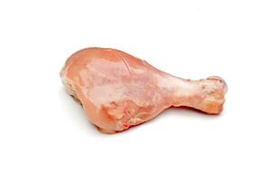 Raw fresh chicken leg piece isolated on white background photo