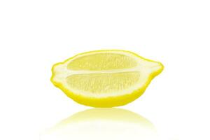 A slice of ripe lemon isolated on a white background. Citrus fruits. photo