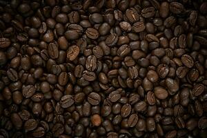 Roasted coffee beans. Texture of coffee beans. Coffee background. Can be used as wallpaper photo