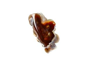 Macro mineral stone fiery Agate on a white background photo
