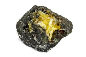 Macro of mineral stone Anglesite in Galena on white background photo