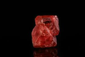 Macro mineral spinel stone on black background photo