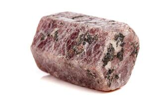 Macro mineral stone Ruby in the breed a white background photo