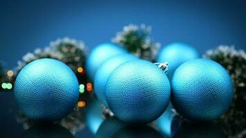 New Year's toys, decorations and other items on a blue abstract background. video