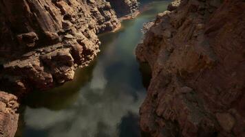 A breathtaking aerial view of a river flowing through a majestic canyon video