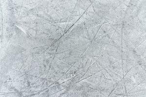 traces on the ice from skates on the rink photo