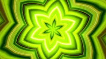 Digital art kaleidoscope with an abstract design, symmetrical and has a flower shape in the center, green and yellow. video