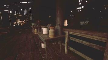 A collection of jars displayed on a rustic wooden bench video