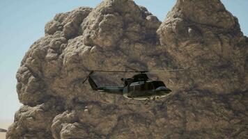 A helicopter flying over a mountain with a rock formation in the background video