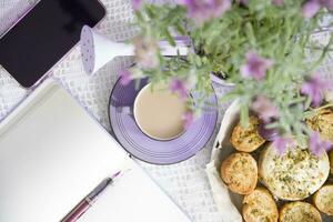 Lavender french breakfast, goat cheese and oven baked baguette, notepad, photo