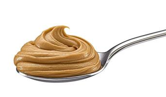 AI Generated Caramel cream, boiled condensed milk swirl in spoon on white background photo