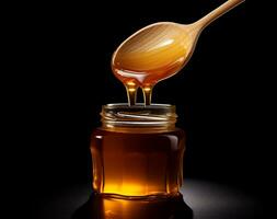 AI Generated Wooden spoon and pouring honey with glass jar on black background photo