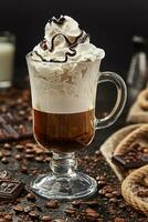 Delicious mochaccino with whipped cream and chocolate topping photo