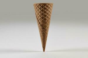 Empty, big, chocolate wafer cone for ice cream isolated on white. Concept of food, treats. Mockup, template for advertising and design. Close up photo