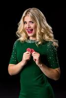 blonde woman posing with chips for gambling photo