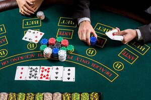 couple playing poker at the table photo