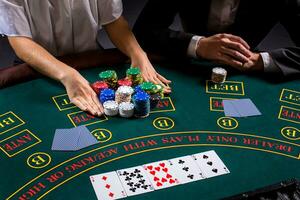 couple playing poker at the table photo