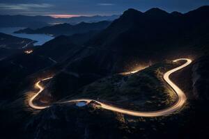 ai generado curvilíneo montaña la carretera con arrastrando luces a noche foto