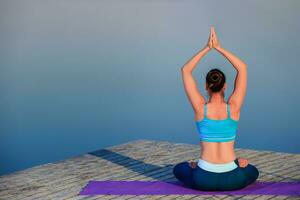 girl doing yoga exercise photo