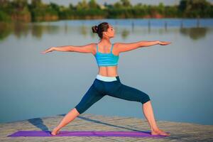 girl doing yoga exercise photo