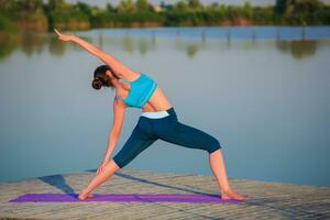 girl doing yoga exercise photo