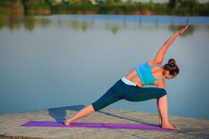 girl doing yoga exercise photo