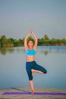 girl doing yoga exercise photo