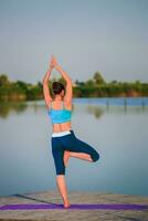 girl doing yoga exercise photo