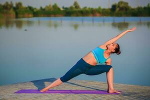 girl doing yoga exercise photo