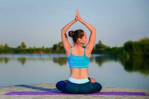 girl doing yoga exercise photo