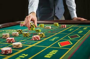 Picture of a green table and betting with chips. photo