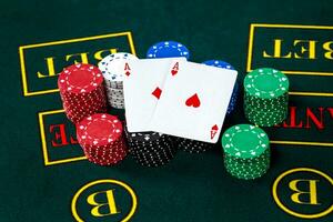 Poker play. Chips and cards photo