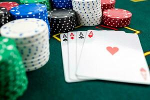 Poker play. Chips and cards photo