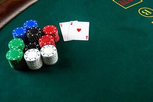 Poker play. Chips and cards photo