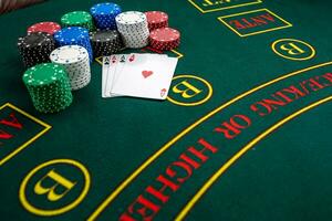 Poker play. Chips and cards photo