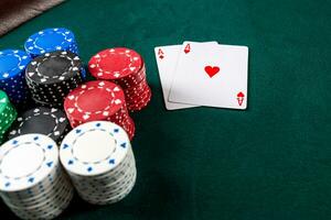 Poker play. Chips and cards photo