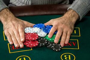 Poker play. Chips and cards photo