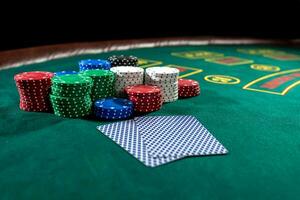 Poker play. Chips and cards photo