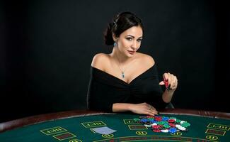 sexy woman with poker cards and chips photo