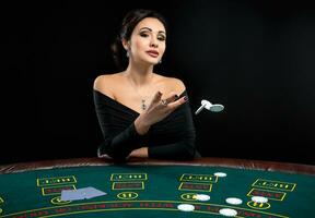 sexy woman with poker cards and chips photo