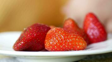 child hand pic  Ripe Red Strawberries video