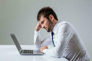 emotional man and laptop photo