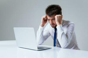 emotional man and laptop photo