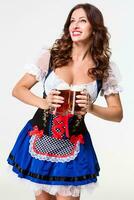 Beautiful young brunette girl of oktoberfest beer stein photo