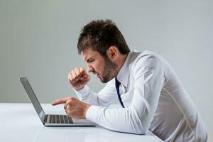 emotional man and laptop photo