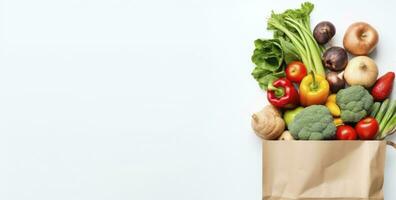 AI generated Healthy food in paper bag vegetables and fruits on white background. AI Generated photo