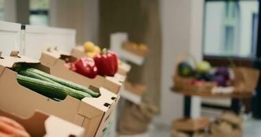 Empty local zero waste eco store with homegrown chemicals free fruits and vegetables in crates, pasta or spices stored in reusable containers. Organic food merchandise at organic market. photo