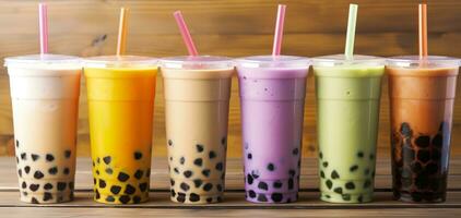 AI generated Plastic cups of different tasty bubble tea on wooden background. Generative AI photo