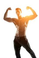 Muscular man posing, flexing his biceps, showing perfect body. photo